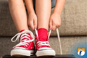 wela hand strength child tying shoes